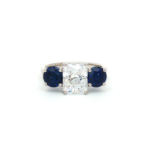 Radiant Cut Ring with Two Brilliant Side Stones and Sapphire Centre Stone