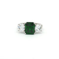 Radiant Cut Ring with Two Brilliant Side Stones and Emerald Centre Stone