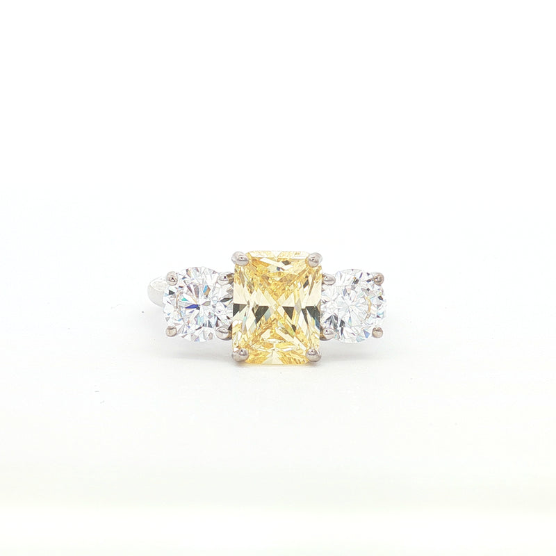Radiant Cut Ring with Two Brilliant Side Stones and yellow Centre Stone