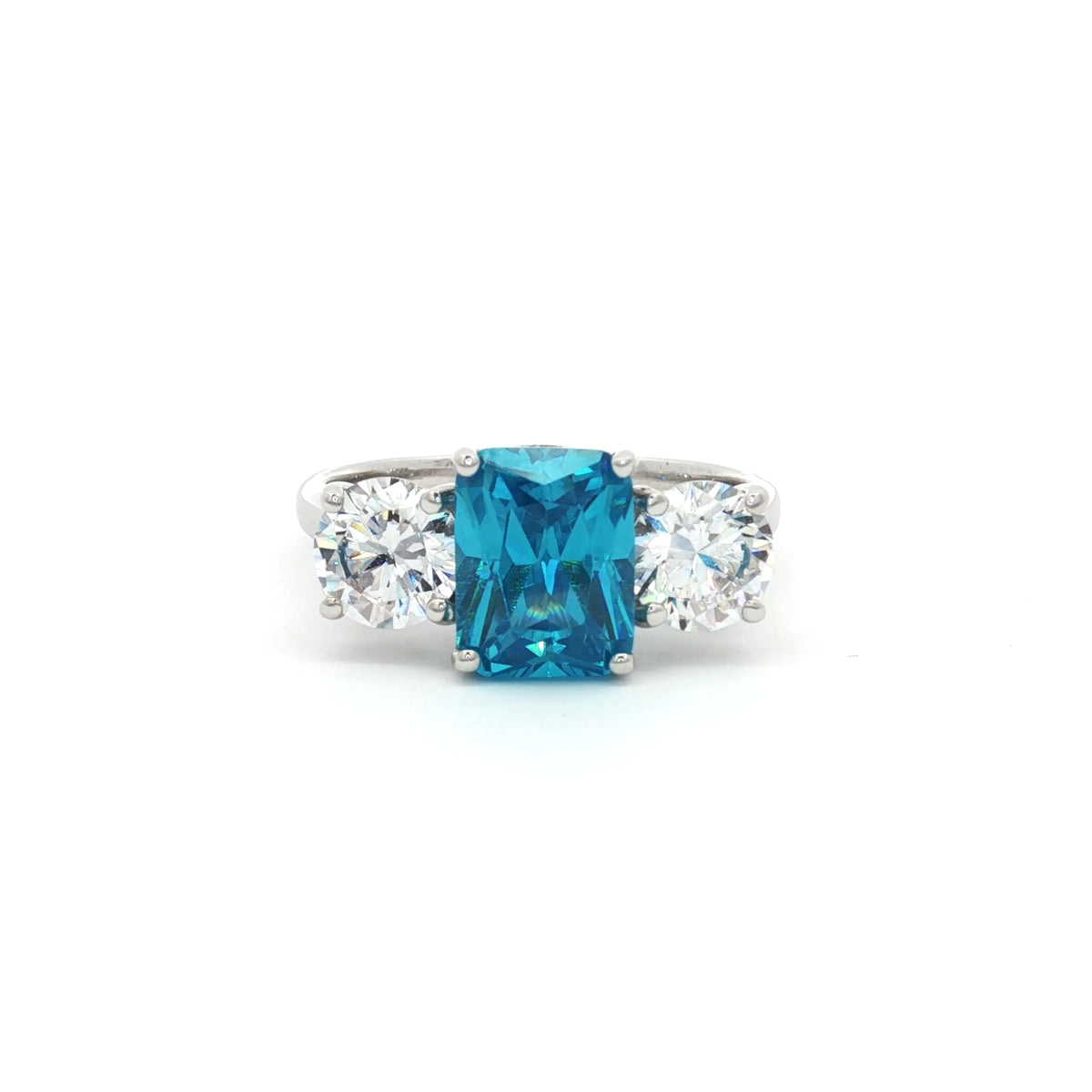 Radiant Cut Ring with Two Brilliant Side Stones and Topaz Centre Stone
