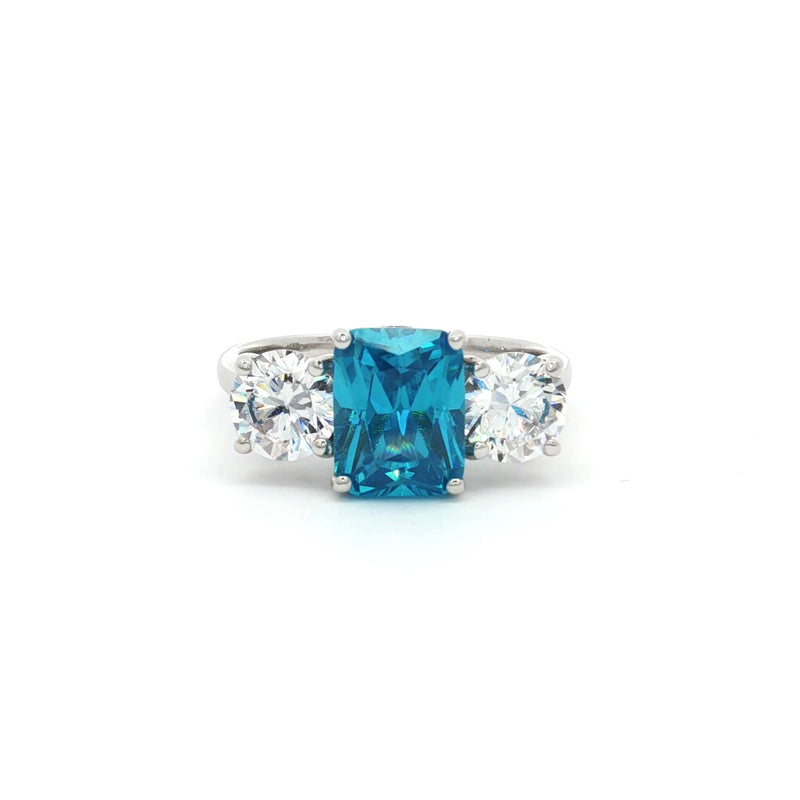 Radiant Cut Ring with Two Brilliant Side Stones and Topaz Centre Stone