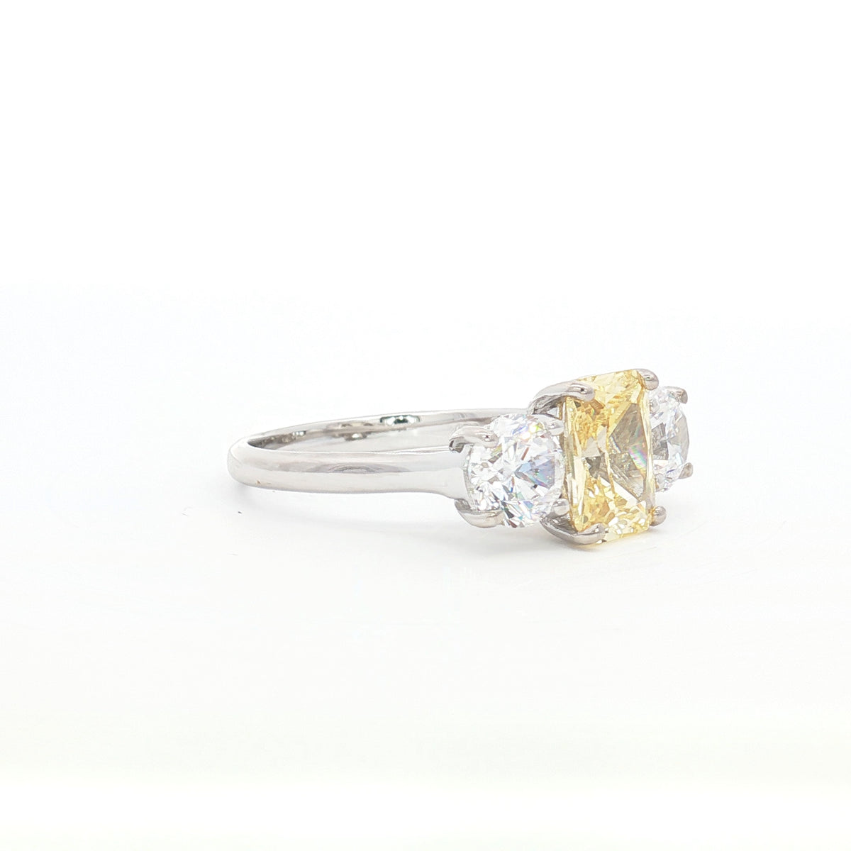 Radiant Cut Ring with Two Brilliant Side Stones and yellow Centre Stone