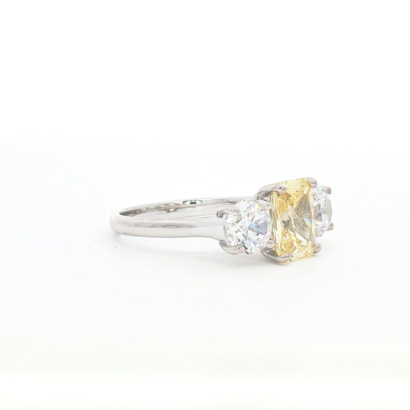 Radiant Cut Ring with Two Brilliant Side Stones and yellow Centre Stone
