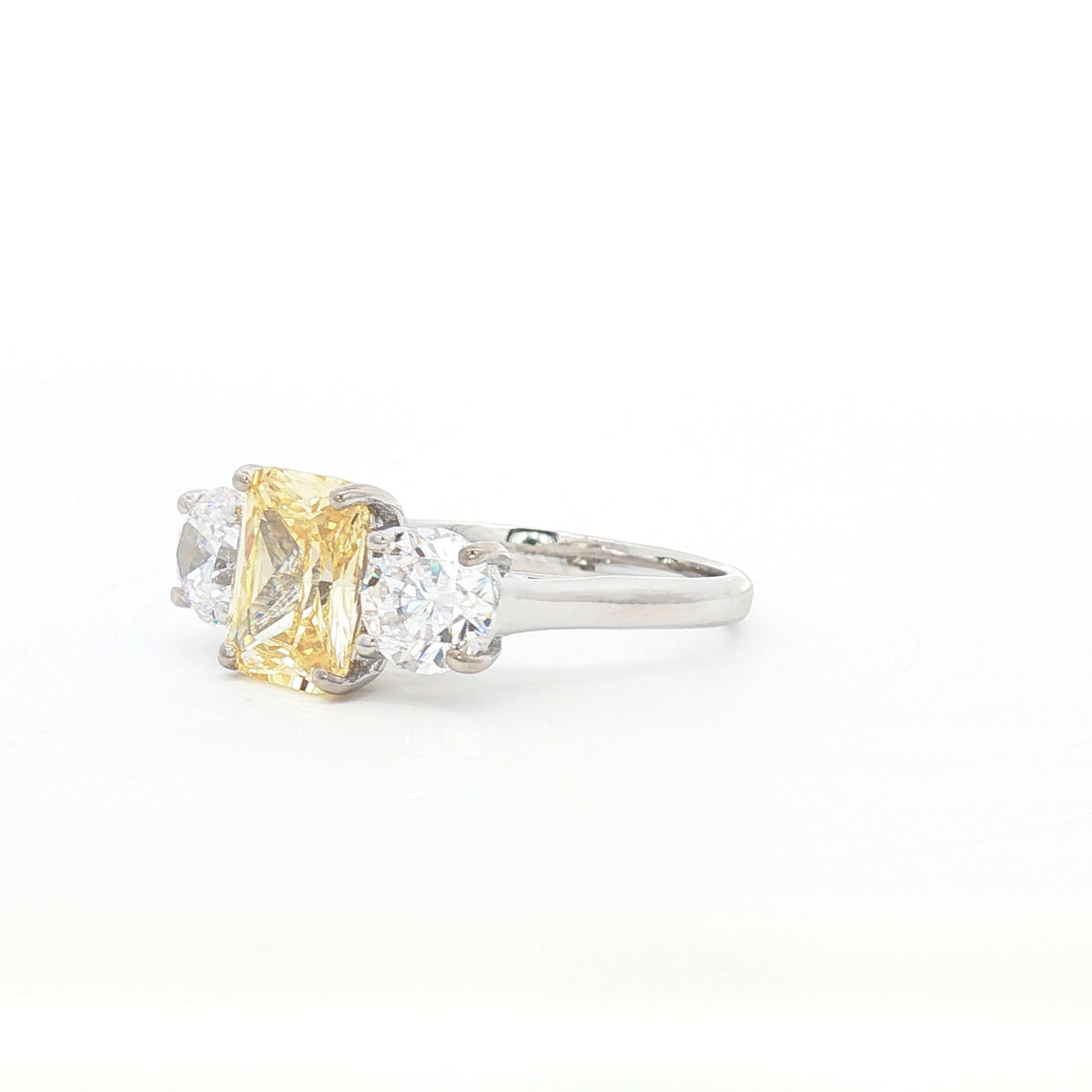 Radiant Cut Ring with Two Brilliant Side Stones and yellow Centre Stone