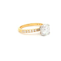 Brilliant Cut Solitaire Ring with Pave Setting