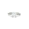 Brilliant Cut Solitaire with Pave Setting
