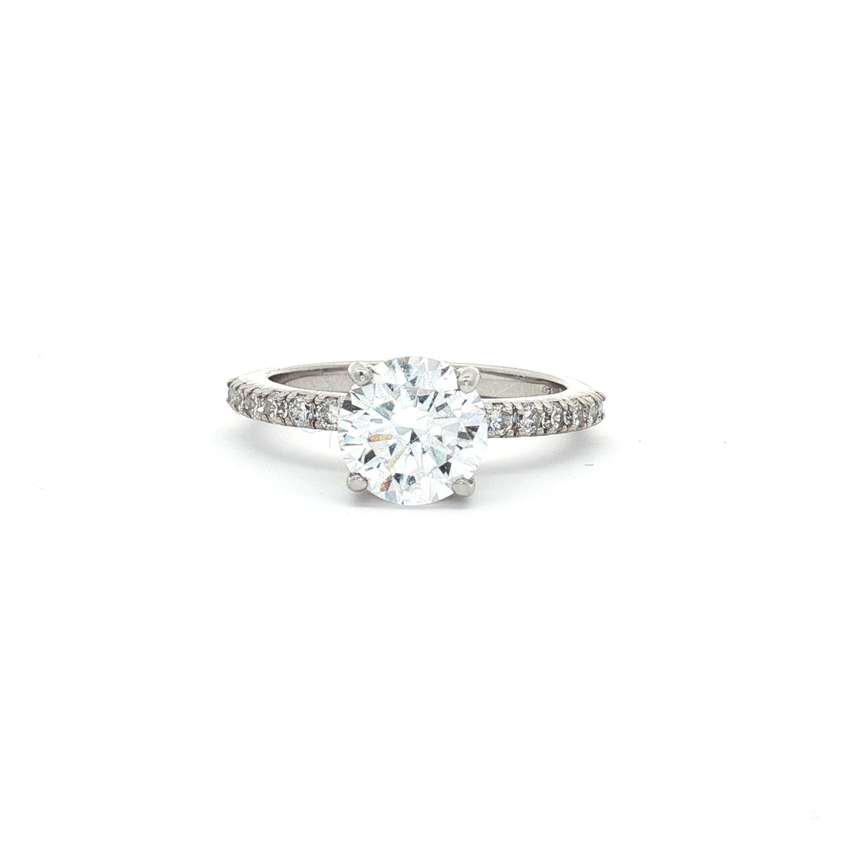 Brilliant Cut Solitaire with Pave Setting