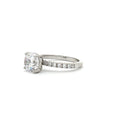 Brilliant Cut Solitaire with Pave Setting