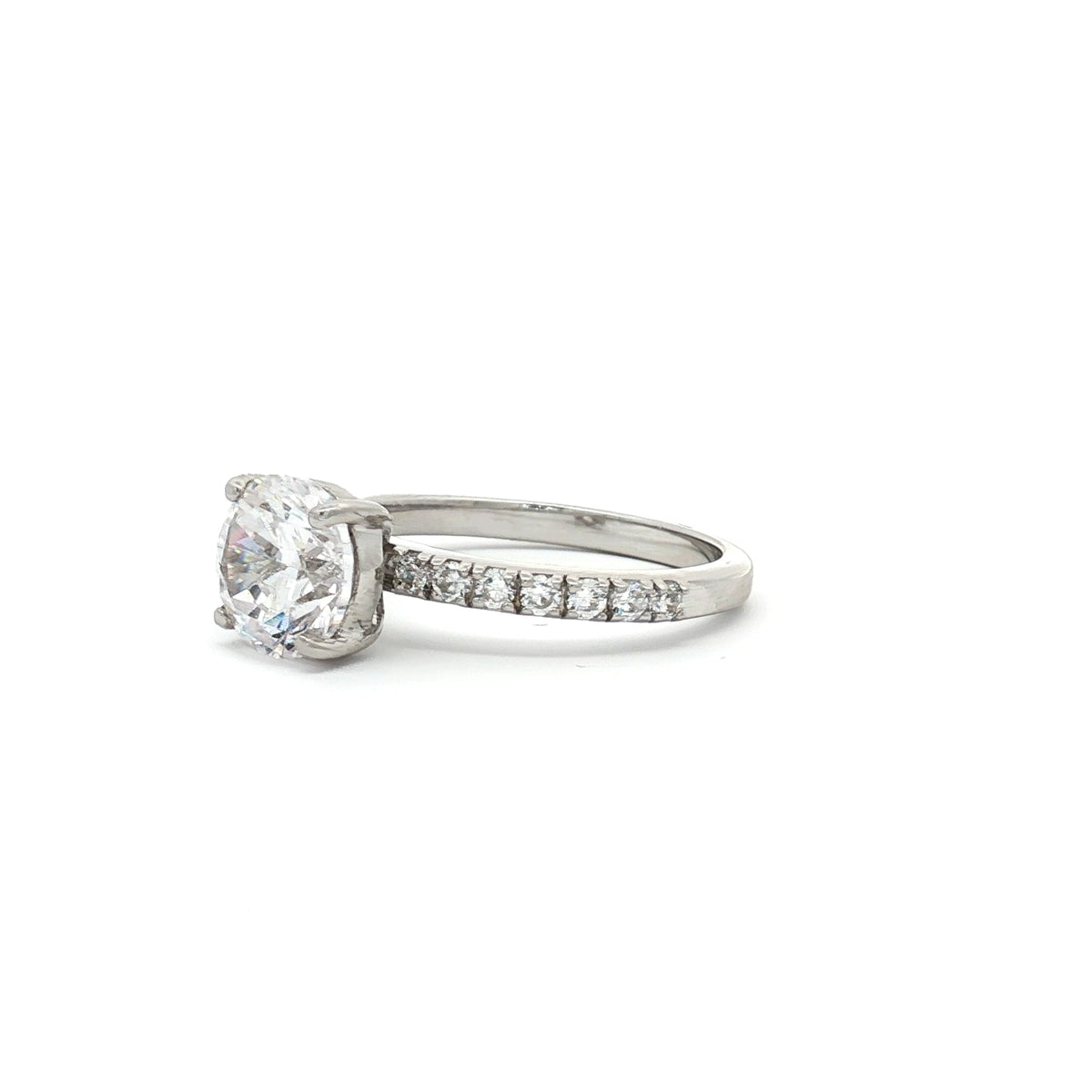 Brilliant Cut Solitaire with Pave Setting