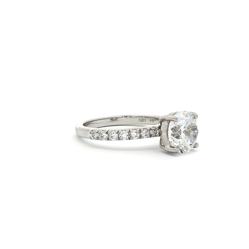 Brilliant Cut Solitaire with Pave Setting
