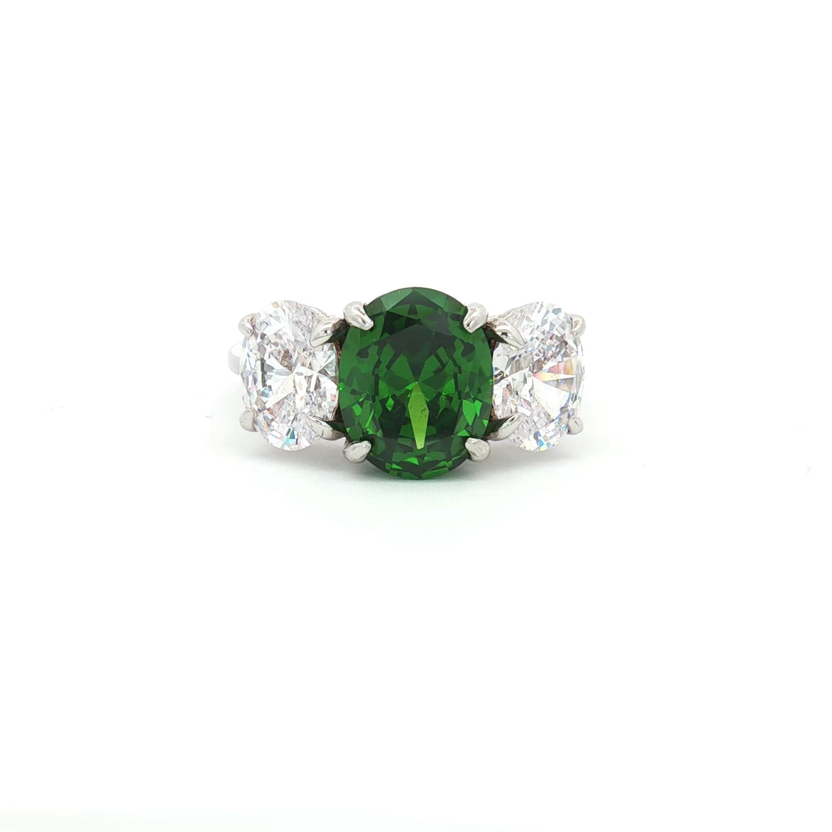 Large Three Stone Oval with Emerald Centre Stone