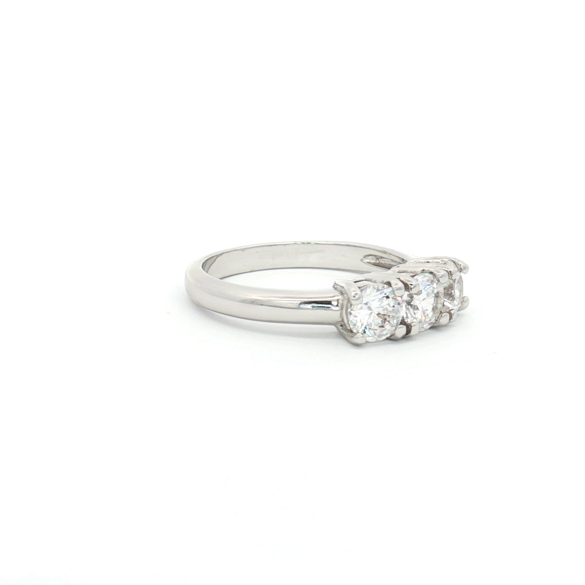 Petite Brilliant Cut Three Stone Ring