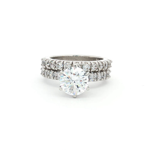 Brilliant Cut Solitaire with Brilliant Cut Side Stones Ring and New Brilliant Half Eternity Band