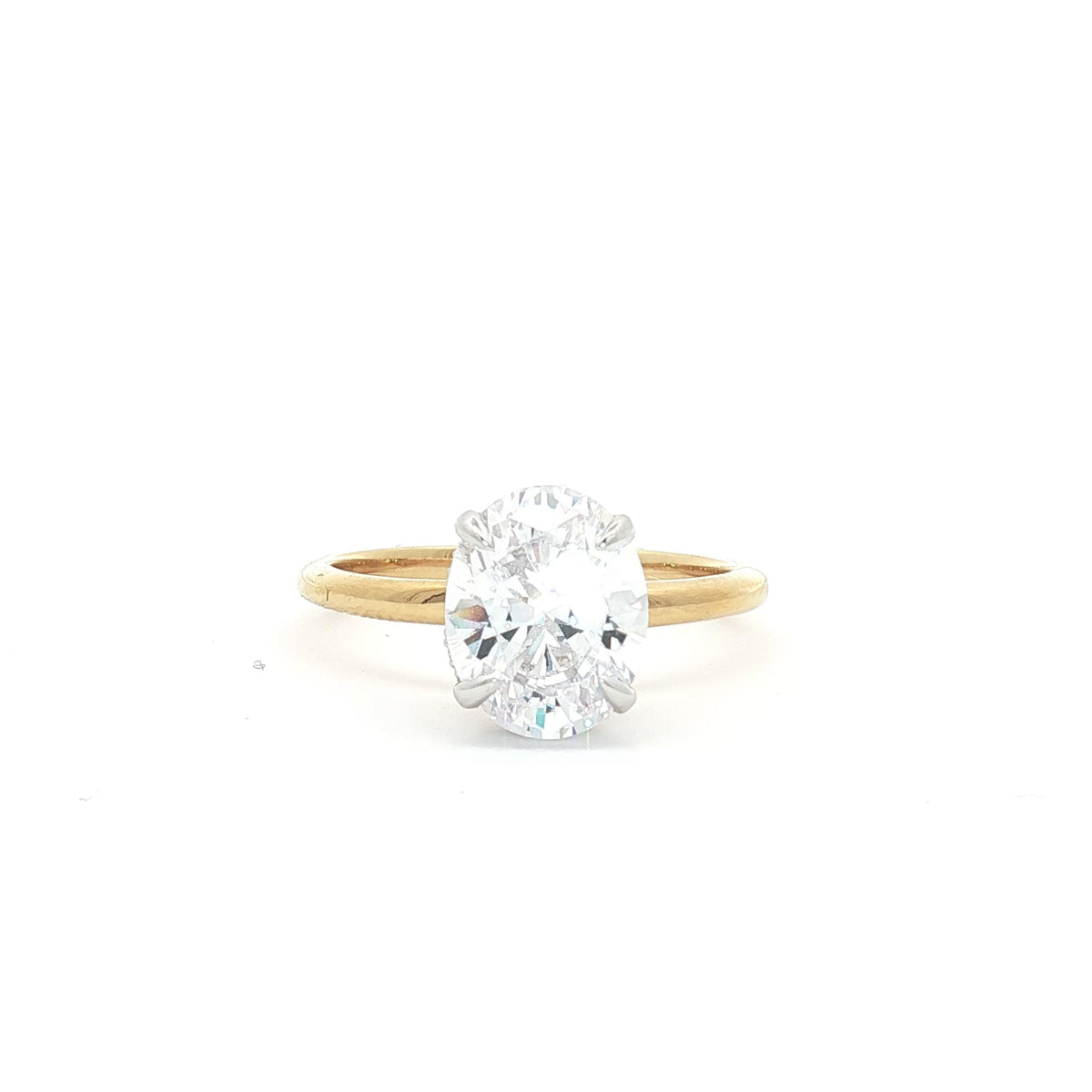 Oval Solitaire with Hidden Halo Ring