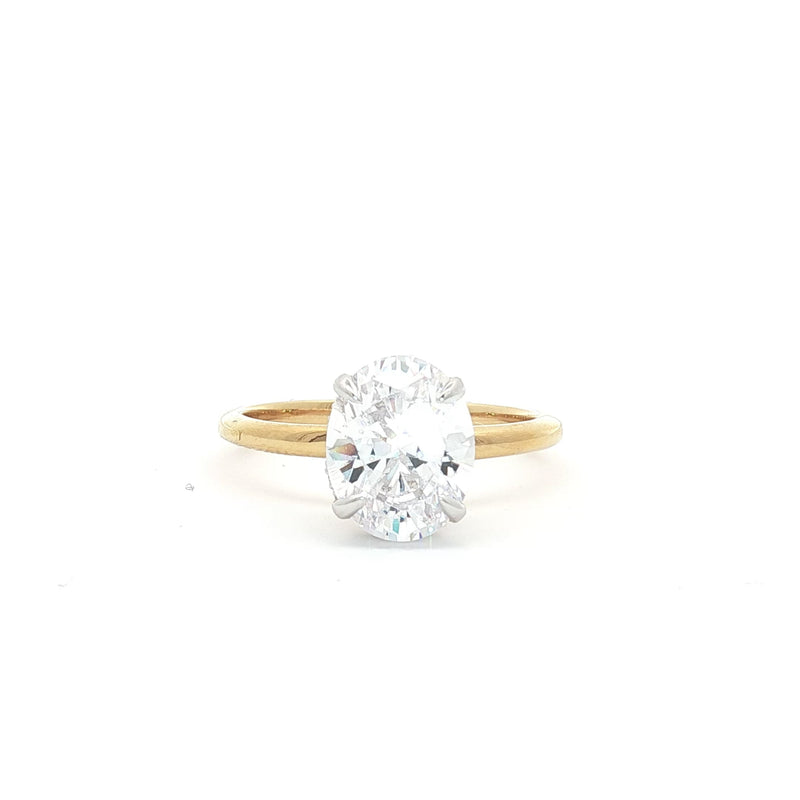 Oval Solitaire with Hidden Halo Ring