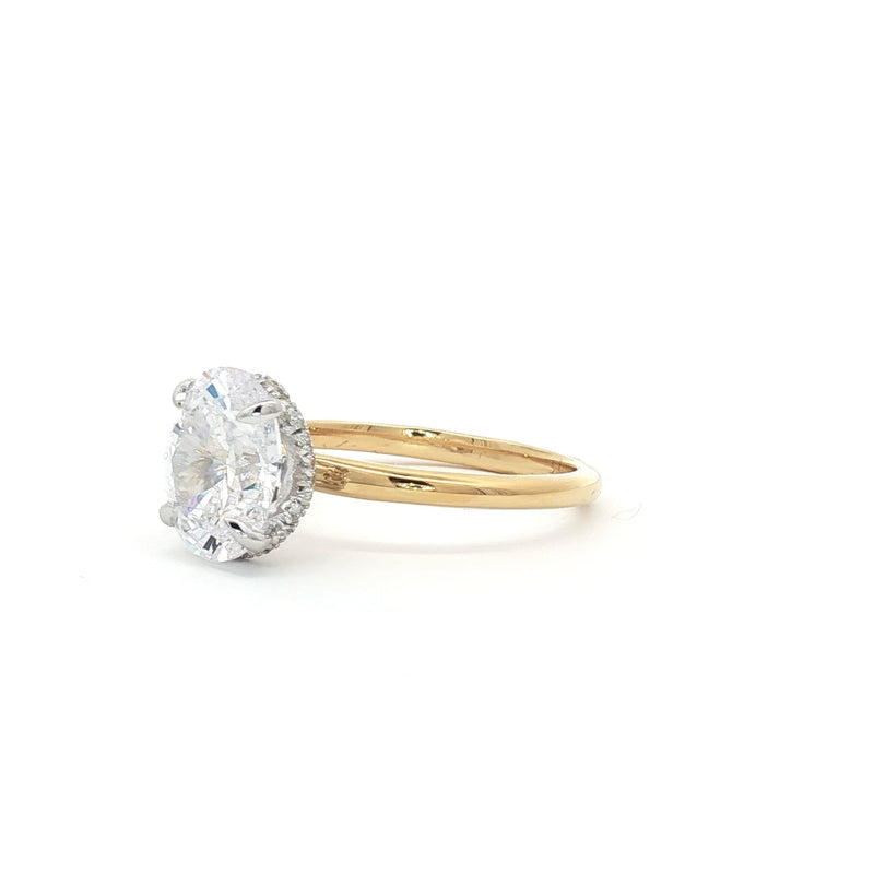 Oval Solitaire with Hidden Halo Ring