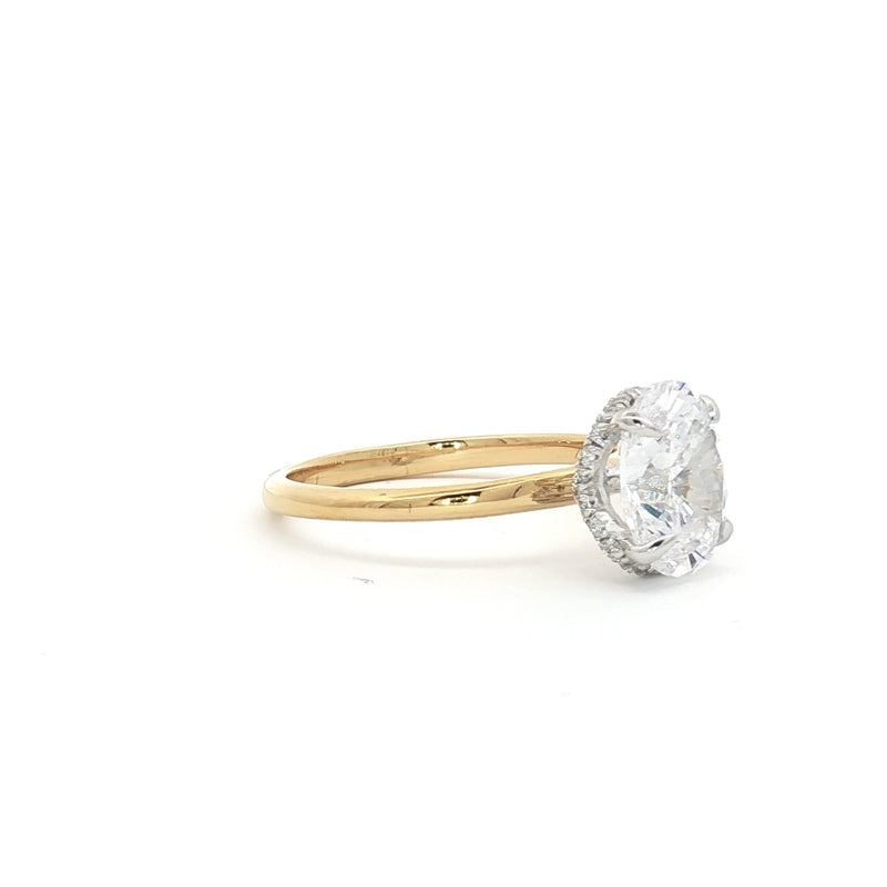 Oval Solitaire with Hidden Halo Ring