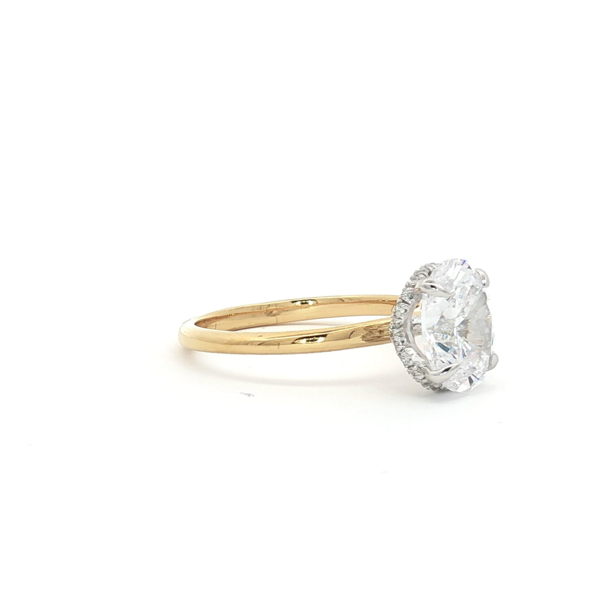 Oval Solitaire with Hidden Halo Ring