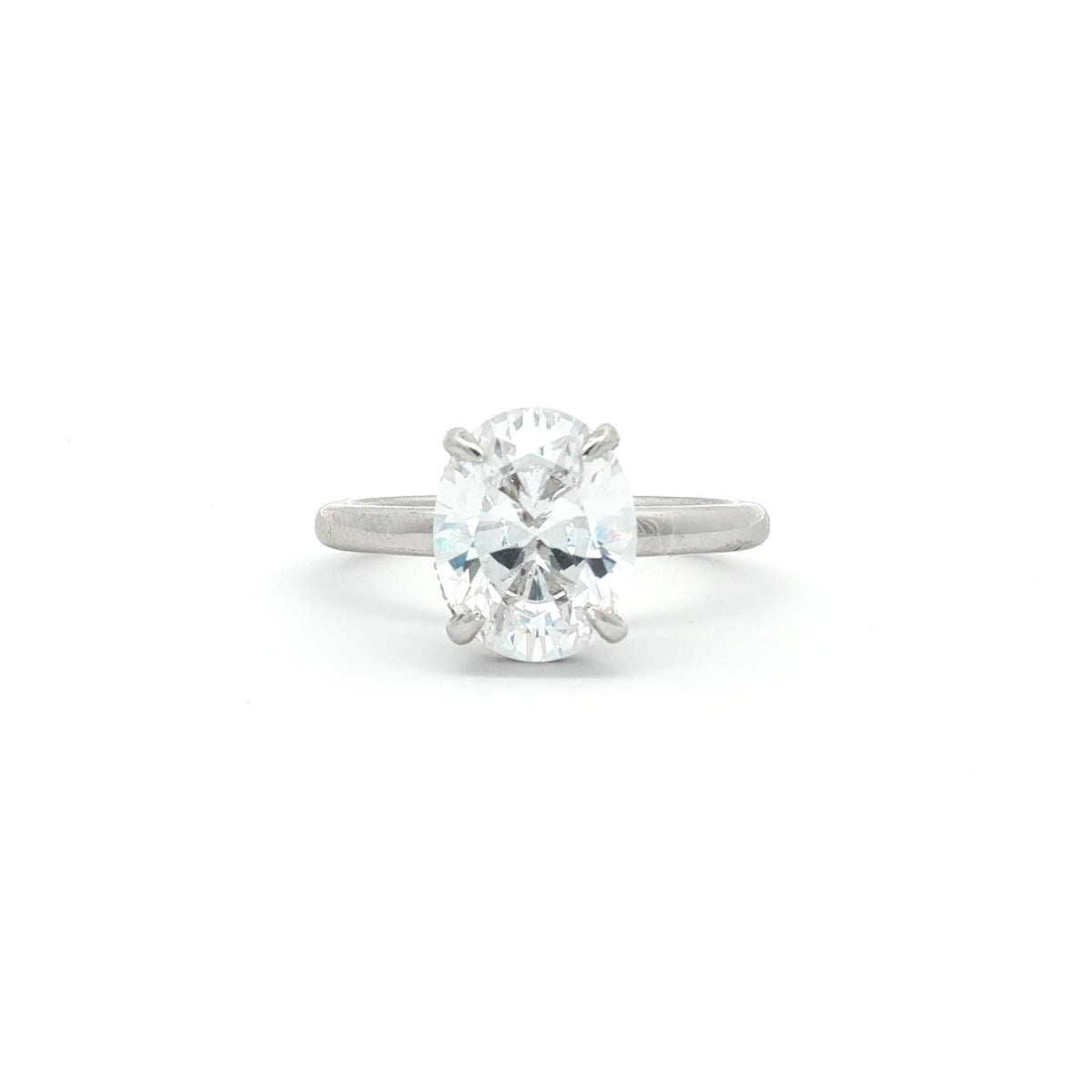 Oval Solitaire with Hidden Halo Ring