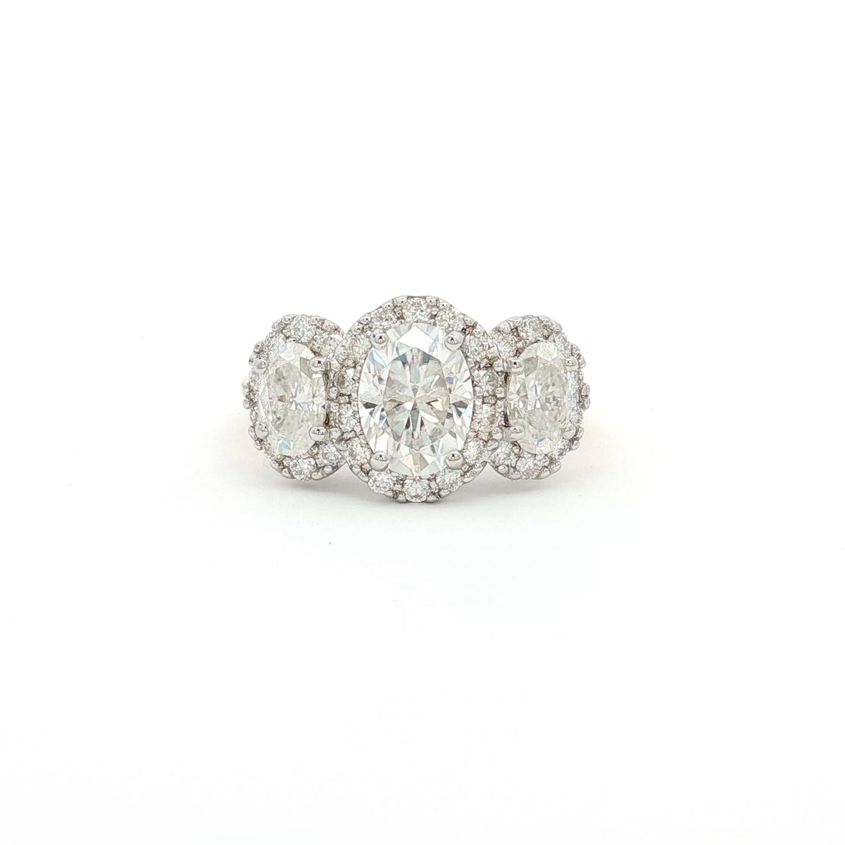 Three Stone Oval Halo Ring