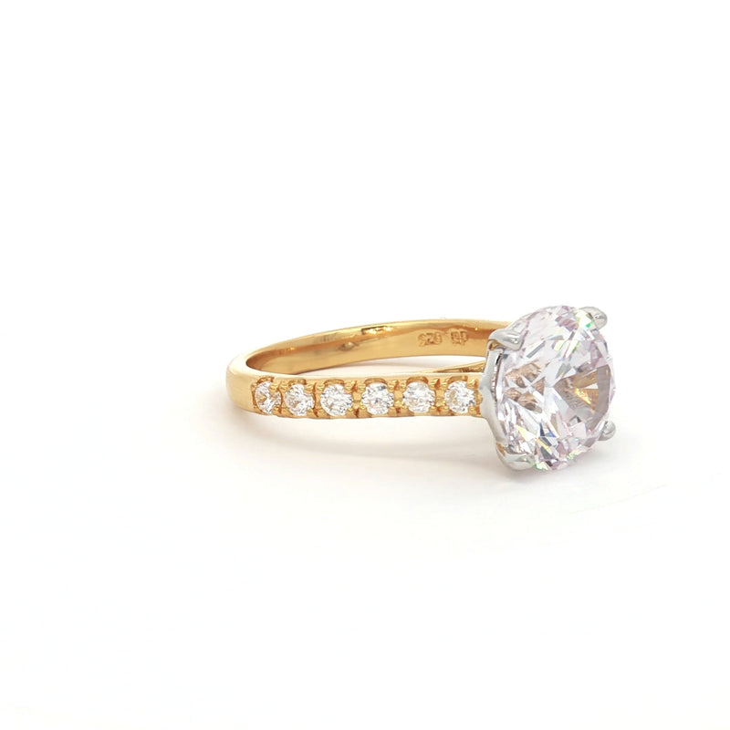 Large Round Solitaire with Brilliant cut stones on Band