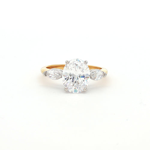 Oval Cut Ring with Marquise Side Stones