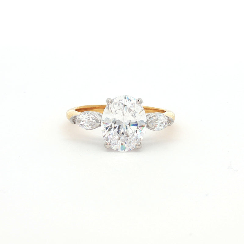 Oval Cut Ring with Marquise Side Stones