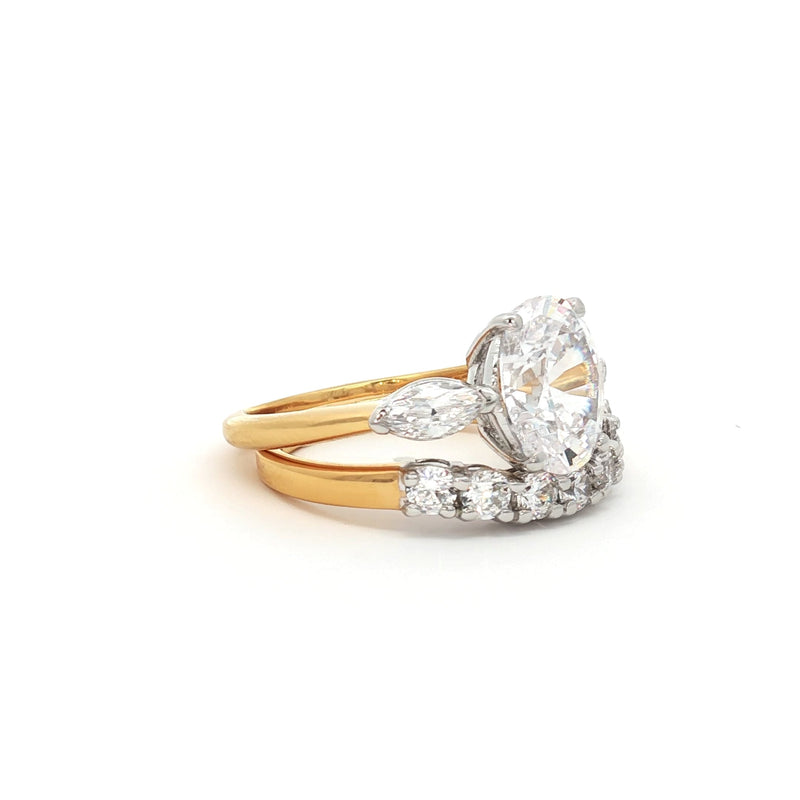Oval Cut Ring with Marquise Side Stones and Seven Stone Curved Band