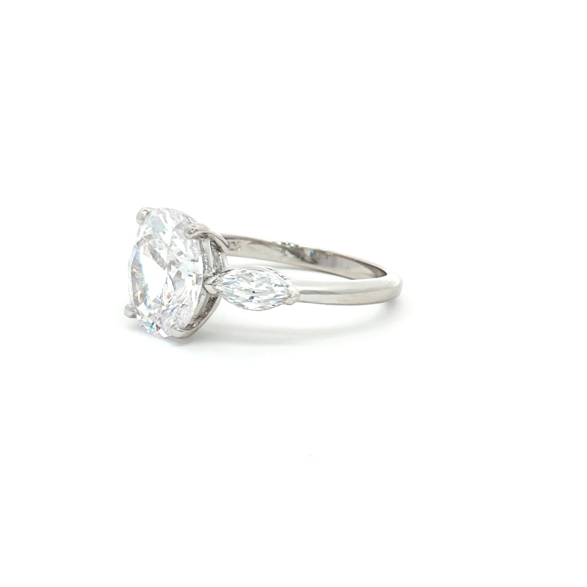Oval Cut Ring with Marquise Side Stones