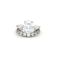Oval Cut Ring with Marquise Side Stones and Seven Stone Curved Band