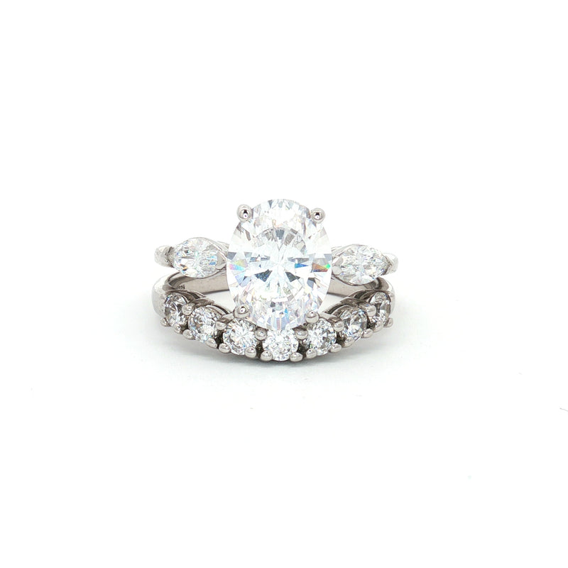 Oval Cut Ring with Marquise Side Stones and Seven Stone Curved Band