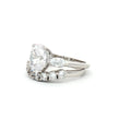 Oval Cut Ring with Marquise Side Stones and Seven Stone Curved Band