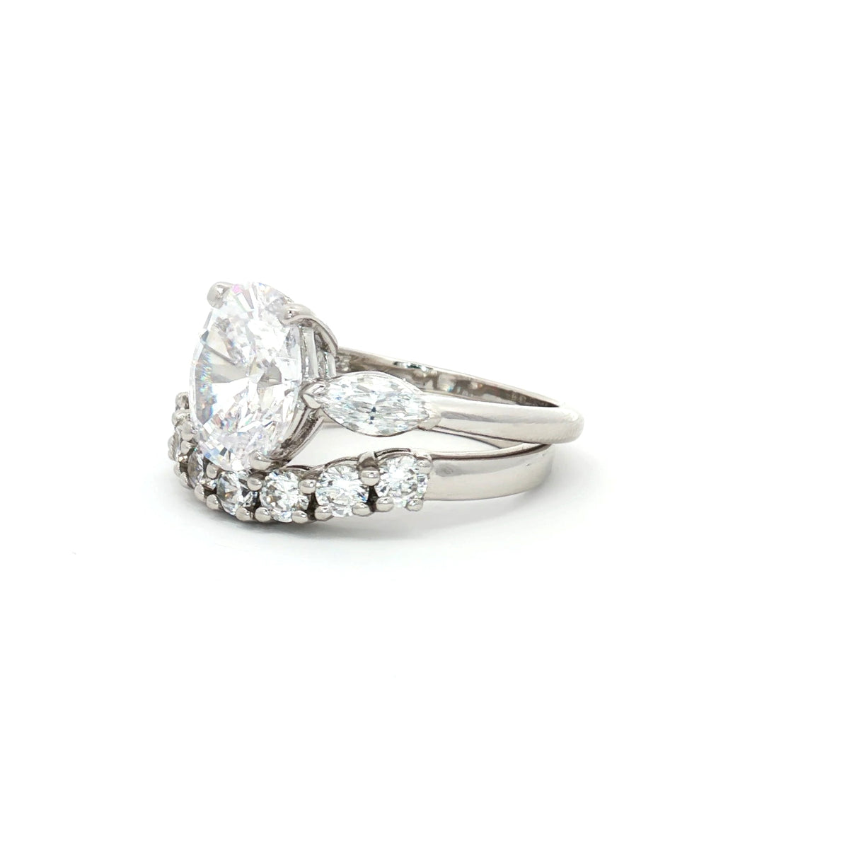 Oval Cut Ring with Marquise Side Stones and Seven Stone Curved Band