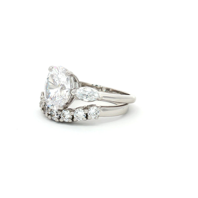 Oval Cut Ring with Marquise Side Stones and Seven Stone Curved Band