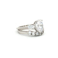Oval Cut Ring with Marquise Side Stones and Seven Stone Curved Band
