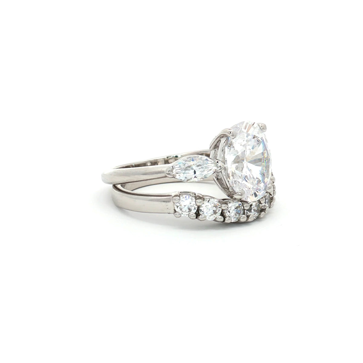Oval Cut Ring with Marquise Side Stones and Seven Stone Curved Band
