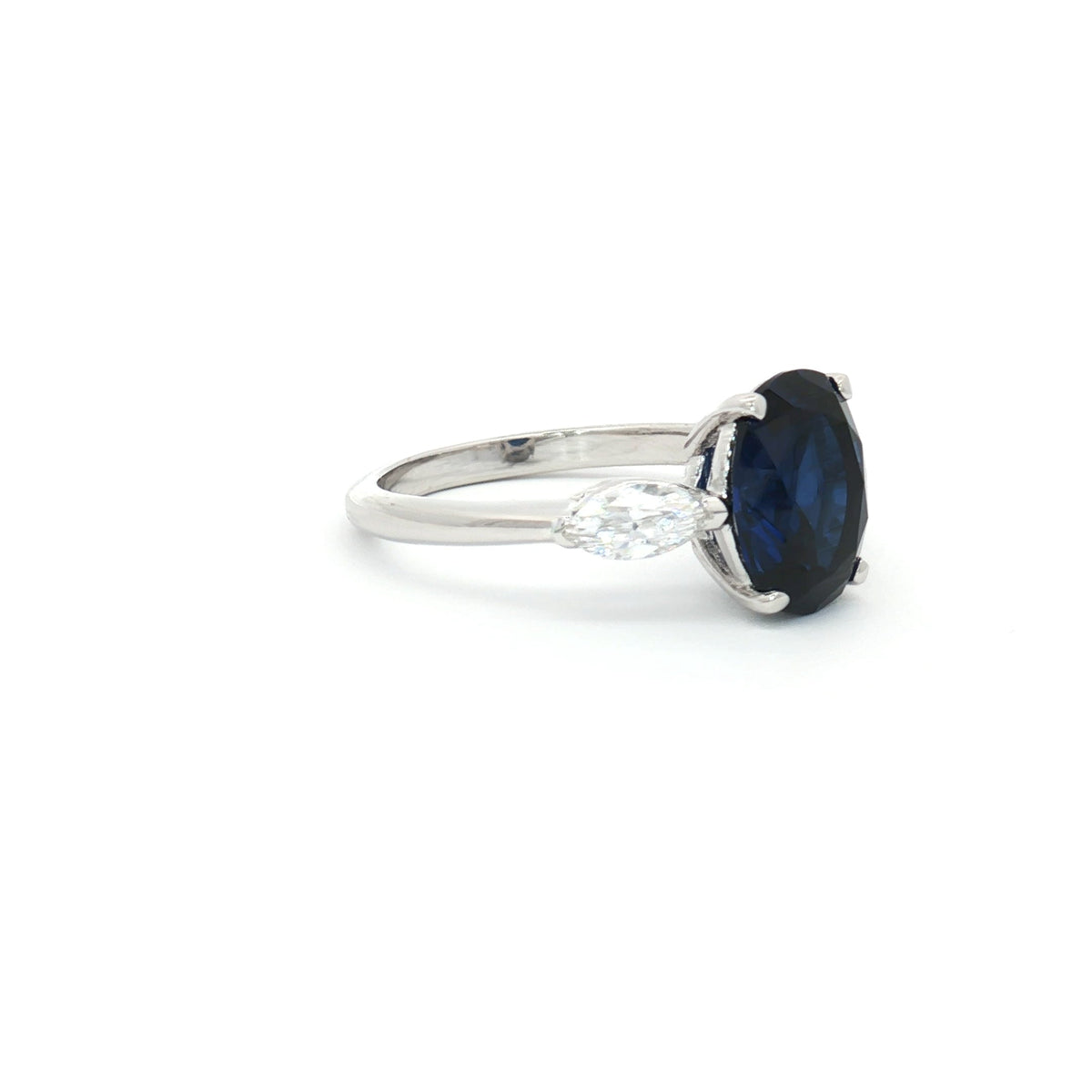 Oval Cut Ring with Marquise Side Stones and Sapphire Centre Stone