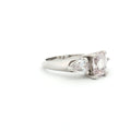 Emerald Cut Three Stone Ring with Pear Side Stones