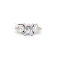 Emerald Cut Three Stone Ring with Pear Side Stones