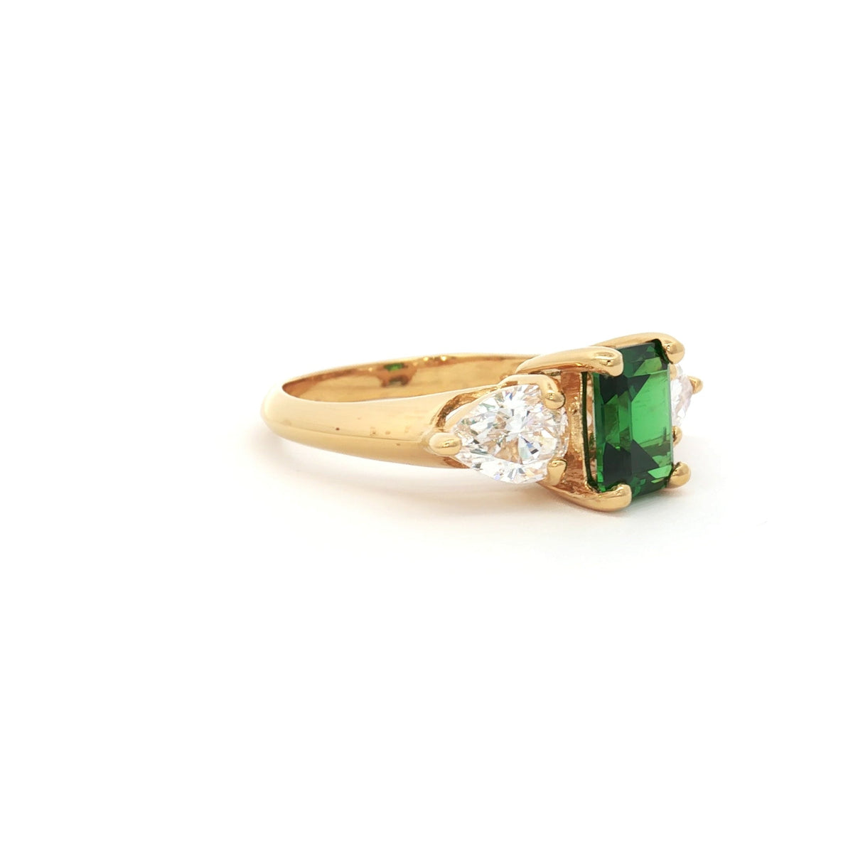 Emerald Cut Three Stone Ring with Pear Side Stones in Yellow Gold