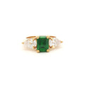 Emerald Cut Three Stone Ring with Pear Side Stones in Yellow Gold