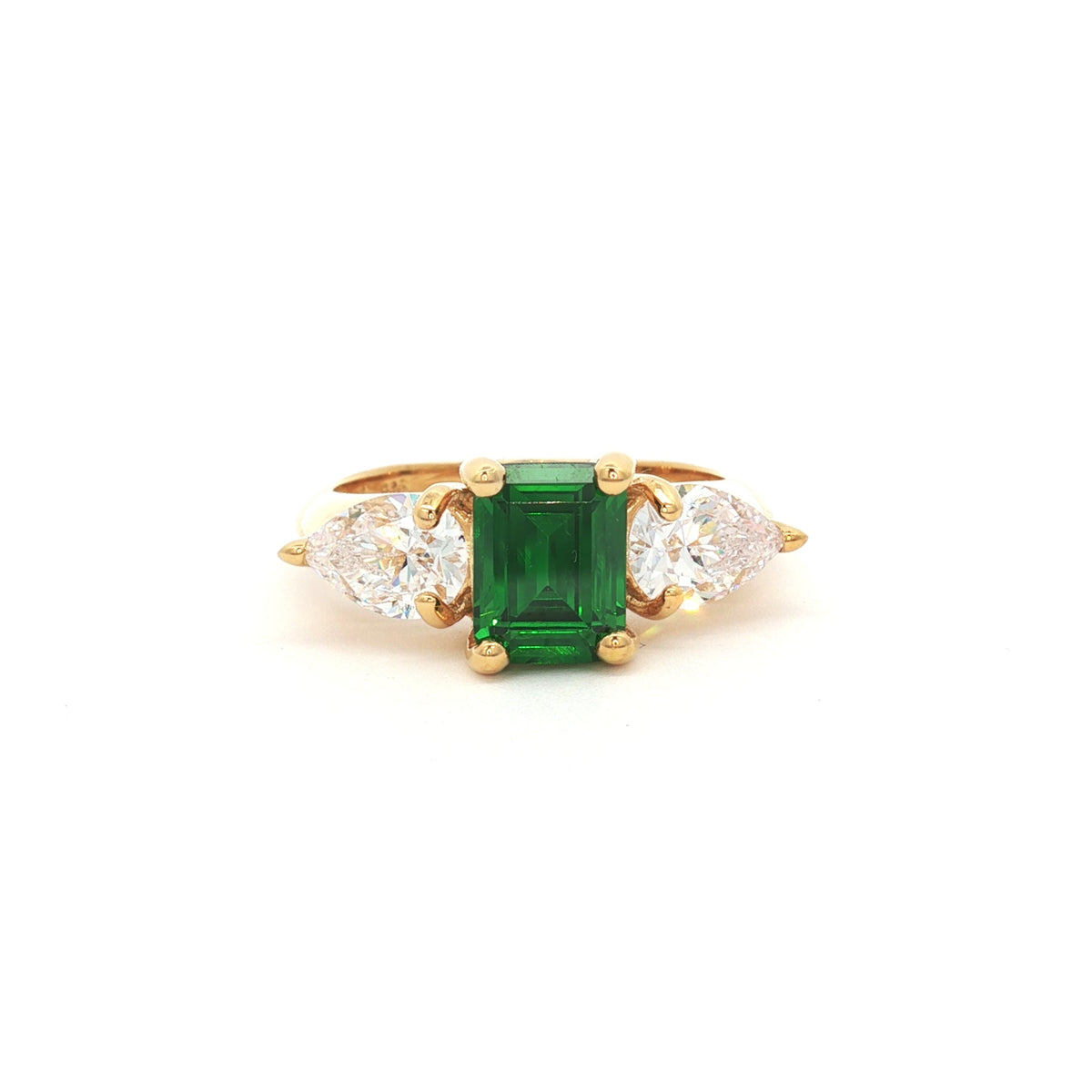 Emerald Cut Three Stone Ring with Pear Side Stones in Yellow Gold
