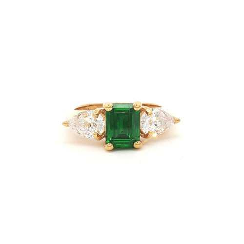 Emerald Cut Three Stone Ring with Pear Side Stones in Yellow Gold