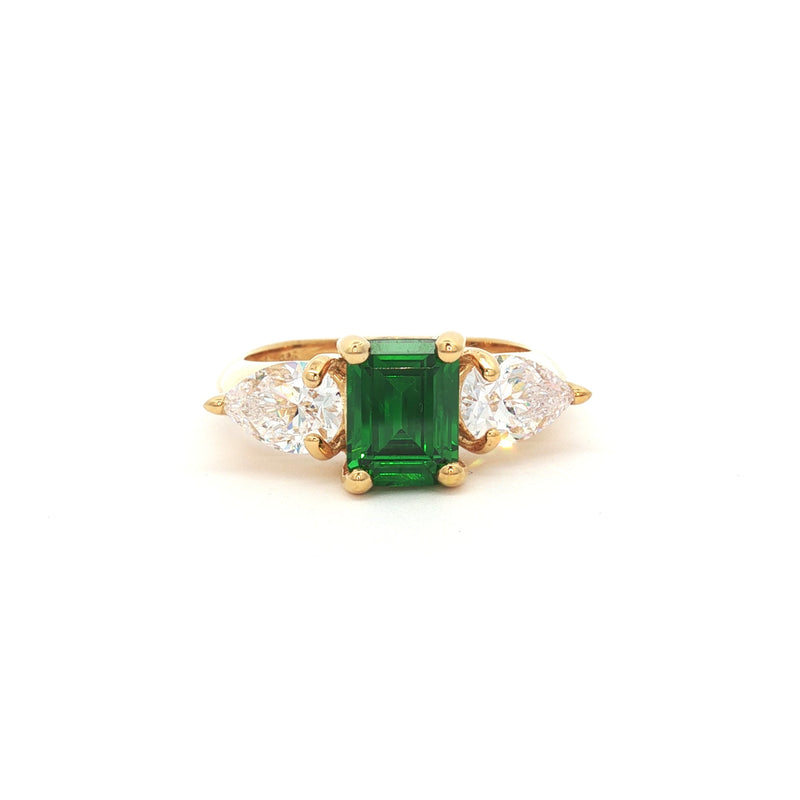 Emerald Cut Three Stone Ring with Pear Side Stones in Yellow Gold