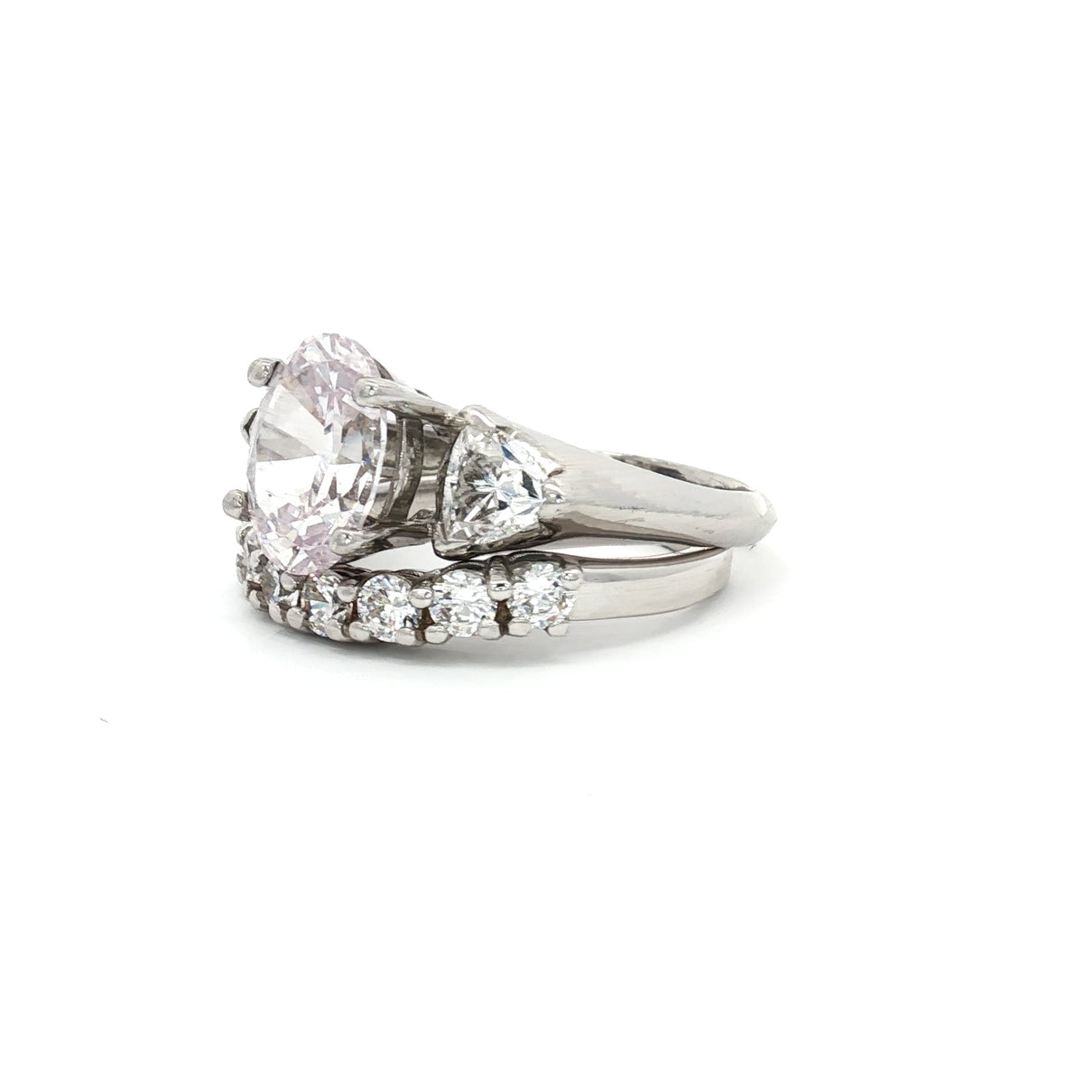 Oval Cut Ring with Trillion Side Stones and Seven Stone Curved Band