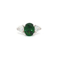 Oval Cut Ring with Trillion Side Stones and Emerald Centre Stone