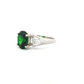 Oval Cut Ring with Trillion Side Stones and Emerald Centre Stone