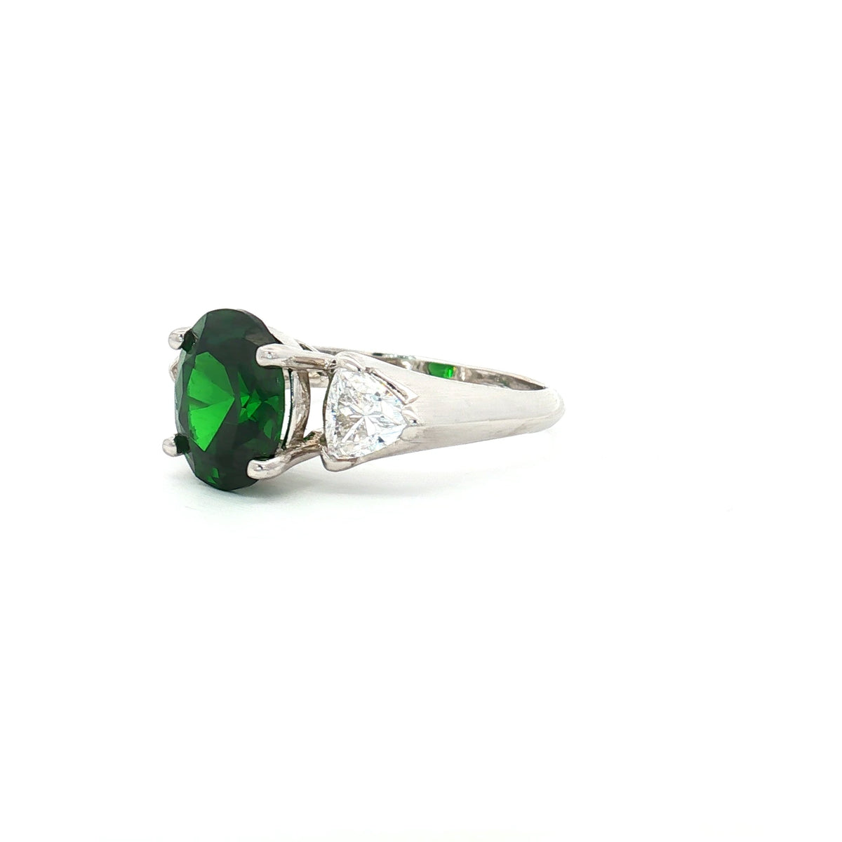 Oval Cut Ring with Trillion Side Stones and Emerald Centre Stone