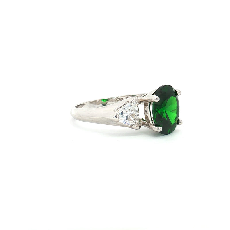 Oval Cut Ring with Trillion Side Stones and Emerald Centre Stone