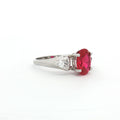 Oval Cut Ring with Trillion Side Stones and Ruby Centre Stone